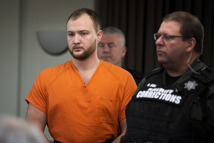 David Y. Bogdanov, left, appears in Clark County Superior Court for a bail review hearing Jan. 2 in connection with the 2019 slaying of transgender teenager Nikki Kuhnhausen. On Tuesday, Judge David Gregerson increased Bogdanov&#039;s bail from $750,000 to $2 million after prosecutors introduced new information about his potential flight risk.
