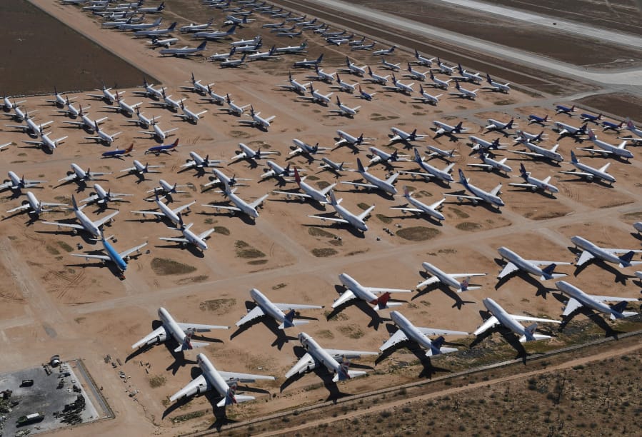 Planes from various airlines sit in storage at a &quot;boneyard&quot; facility March 28, 2019, beside the Southern California Logistics Airport in Victorville, Calif.