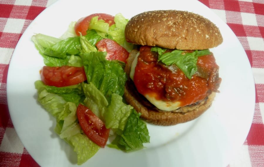Pizza-flavored chicken burgers and salad.