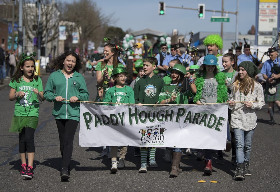 Hough Elementary School students lead the Paddy Hough Parade down Vancouver&#039;s Main Street in 2019.