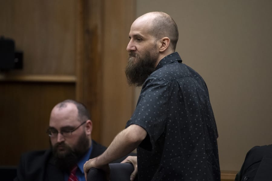 Dustin Zapel, who fatally stabbed two men who lived in his apartment complex in July 2017, awaits opening statements in his double murder trial Tuesday in Clark County Superior Court.