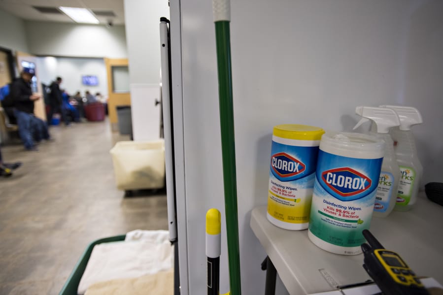 Containers of disinfectant wipes are part of some new sanitizing stations at the Navigation Center. A janitorial crew disinfects the entire facility nightly.