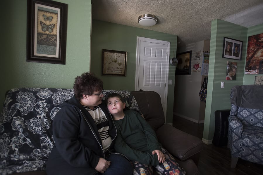 Melissa Dodge, with her son, 9-year-old Lucas, co-founded a support group for mothers of children with autism. The family is among the thousands around the county affected by closures due to the coronavirus pandemic. Lucas, who has autism, is struggling to adjust to the changes.