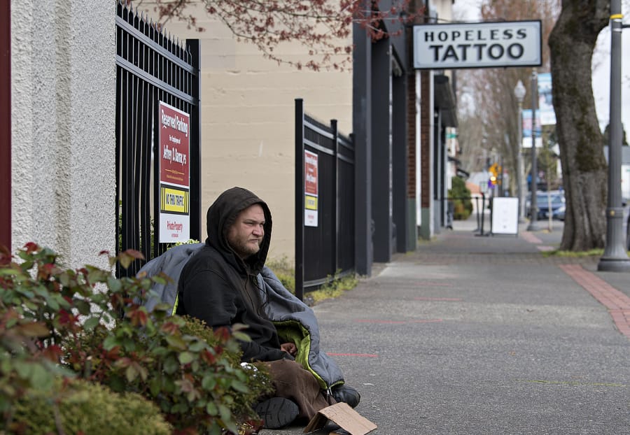 John Beakley of Vancouver, who is homeless, panhandles for money and food along Main Street in Uptown Village on Thursday morning. Beakley, who is one of hundreds of people in Vancouver without a home during the COVID-19 pandemic, said anything would help him at this point. &quot;It can&#039;t get any worse. ... I hope I don&#039;t get it,&quot; he said.