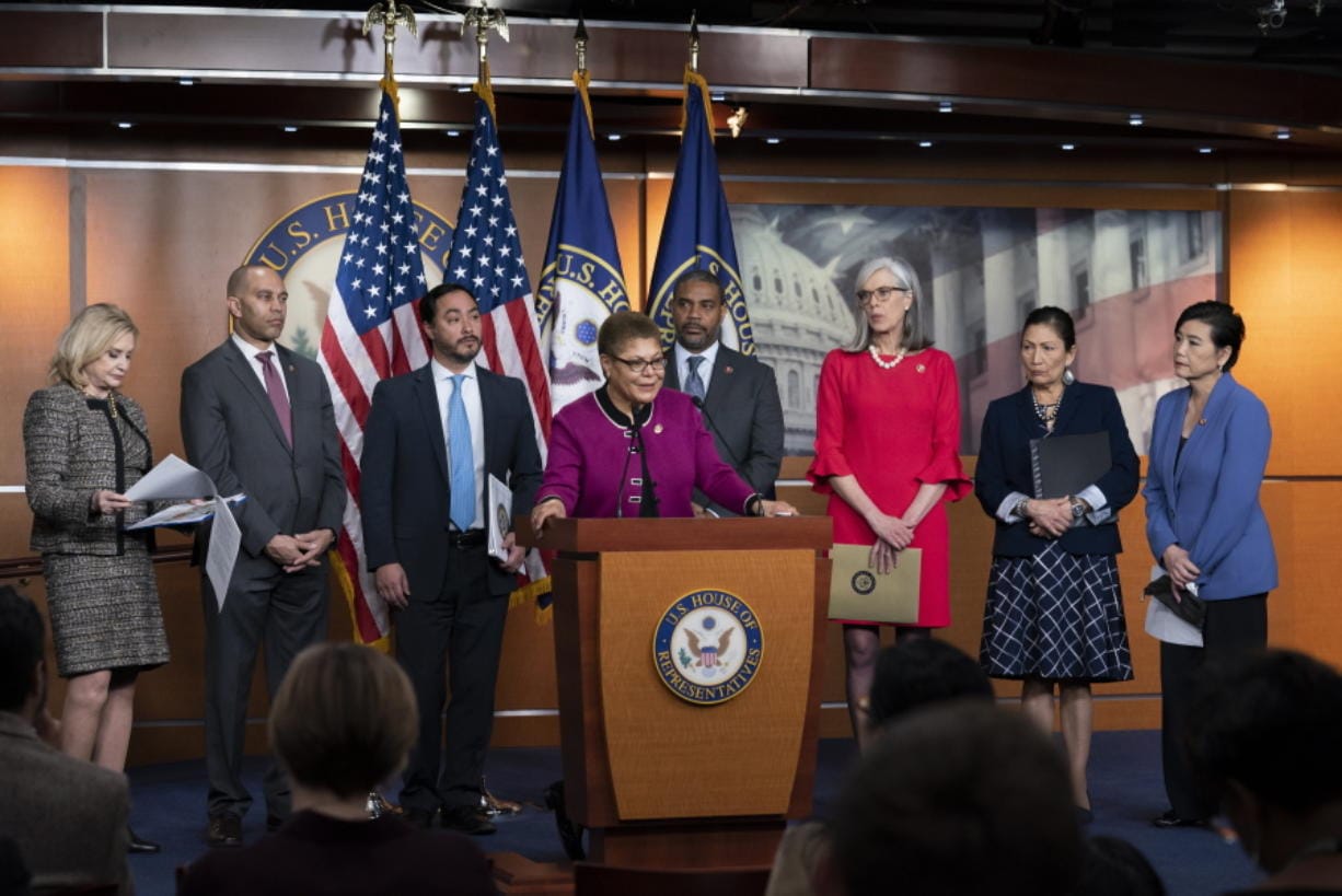 Members of the Congressional Tri-Caucus speaks to reporters to discuss the 2020 Census and the concern for getting an accurate count in minority communities, on Capitol Hill in Washington, Thursday, March 5, 2020. From left are Rep. Carolyn Maloney, D-N.Y., chair of the House Oversight Committee, House Democratic Caucus Chair Hakeem Jeffries, D-N.Y., Rep. Joaquin Castro, D-Texas, chair of the Congressional Hispanic Caucus, Rep. Karen Bass, D-Calif., chair of the Congressional Black Caucus, Rep. Steven Horsford, D-Nev., chair of the 2020 Census Task Force for the CBC, House Democratic Caucus Vice Chair Katherine Clark, D-Mass., Rep. Deb Haaland, D-N.M., Native American Caucus co-chair, and Rep. Judy Chu, D-Calif., chair of the Congressional Asian Pacific American Caucus. (AP Photo/J.