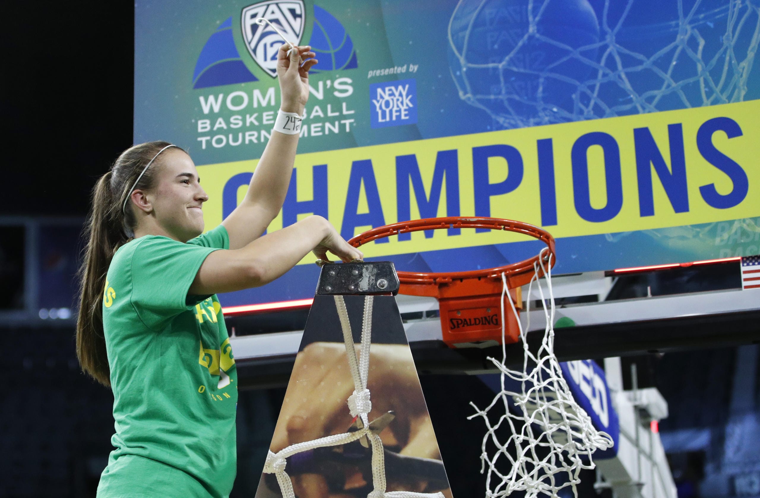 Oregon's Sabrina Ionescu (20) reacts while cutting down the net after defeating Stanford in an NCAA college basketball game in the final of the Pac-12 women's tournament Sunday, March 8, 2020, in Las Vegas.