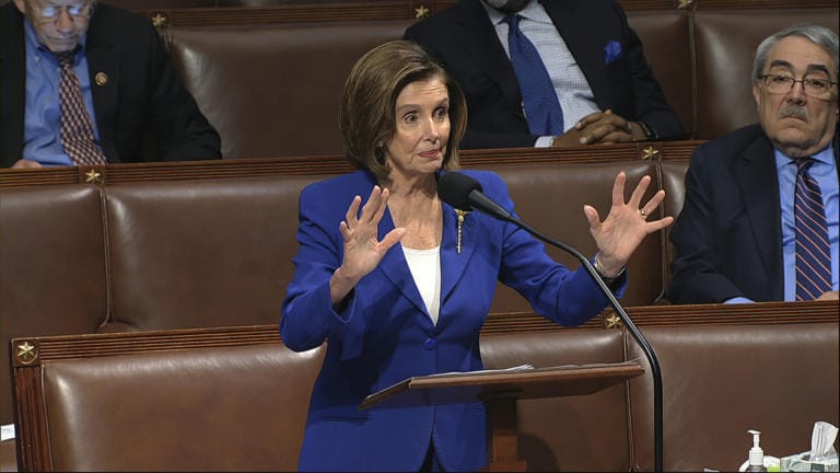 In this image from video, House Speaker Nancy Pelosi of Calif., speaks on the floor of the House of Representatives at the U.S. Capitol in Washington, Friday, March 27, 2020.