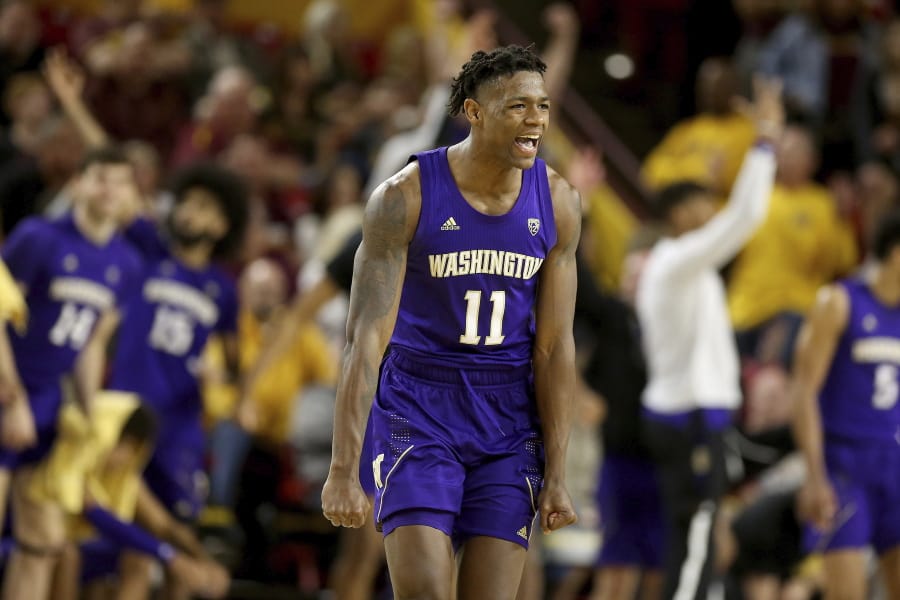 Washington&#039;s Nahziah Carter (11) celebrates a3-pointer against Arizona State late in the second half of an NCAA college basketball game Thursday, March 5, 2020, in Tempe, Ariz. Washington won 90-83.