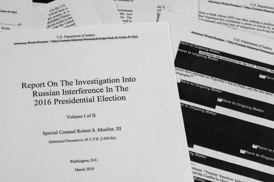 FILE - In this April 18, 2019, file photo, special counsel Robert Mueller&#039;s redacted report on Russian interference in the 2016 presidential election is photographed in Washington. The Justice Department must give to Congress secret grand jury testimony from special counsel Robert Mueller&#039;s Russia investigation, a federal appeals court ruled Tuesday, March 10, 2020.