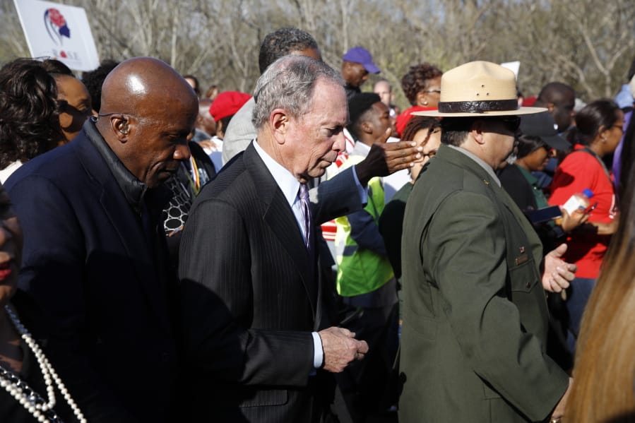 Democratic presidential candidate Mike Bloomberg walks across the Edmund Pettus Bridge in Selma, Ala., Sunday, March 1, 2020, to commemorate the 55th anniversary of &quot;Bloody Sunday,&quot; when white police attacked black marchers in Selma.