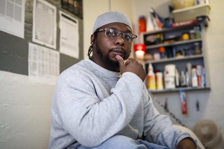 In this Feb. 13, 2020, photo, inmate Myon Burrell sits inside his cell at Minnesota Correctional Facility in Stillwater, Minn. Sentenced to life after a young black girl was killed by a stray bullet, Burrell&#039;s story has been told - and told again - by U.S. Sen. Amy Klobuchar while trumpeting her tough-on-crime record as a top Minneapolis prosecutor. But a year-long Associated Press investigation discovered major flaws and inconsistencies in the case, raising questions about whether the 16-year-old alleged shooter may have been wrongly convicted.