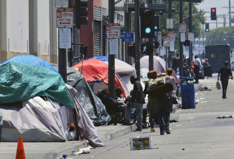 Tents housing homeless people line a street in May in downtown Los Angeles.