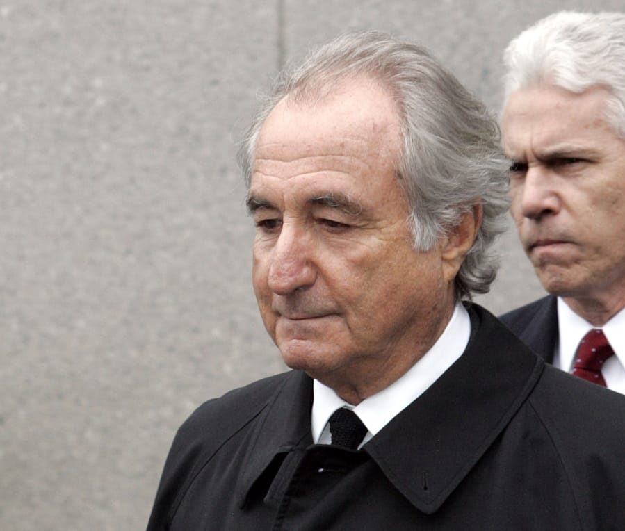 FILE- In this March 10, 2009 file photo, former financier Bernard Madoff exits Federal Court in New York. Citing the scope and magnitude of his decades-long Ponzi scheme that cost thousands of investors billions of dollars, federal prosecutors do not support a compassionate release from prison for 81-year-old Madoff, who may only have 18 months to live.