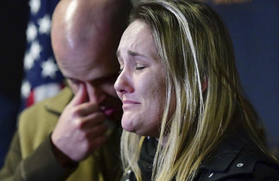 FILE - In this Jan. 30, 2020 file photo Landon Hoitt, foreground, and Albert Stauch, background, parents of Gannon Stauch, make a tearful plea for the return of their son, during a news conference at the El Paso County Sheriff&#039;s Office, in Colorado Springs, Colo. Authorities plan to announce a &quot;major development&quot; on Monday, March 2, in the case of Gannon Stauch, an 11-year-old Colorado boy missing for over a month. Gannon Stauch was reported missing Jan. 27, 2020 by his stepmother, Letecia Stauch, who said he left left to go to a friend&#039;s house in the afternoon.