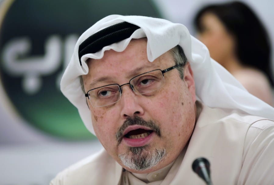 FILE - In this Dec. 15, 2014 file photo, Saudi journalist Jamal Khashoggi speaks during a press conference in Manama, Bahrain. Three leading international NGOs say they&#039;re boycotting meetings Saudi Arabia is holding with civil society groups ahead of hosting this year&#039;s Group of 20 summit. Transparency International, Amnesty International and CIVICUS said Monday, Jan.