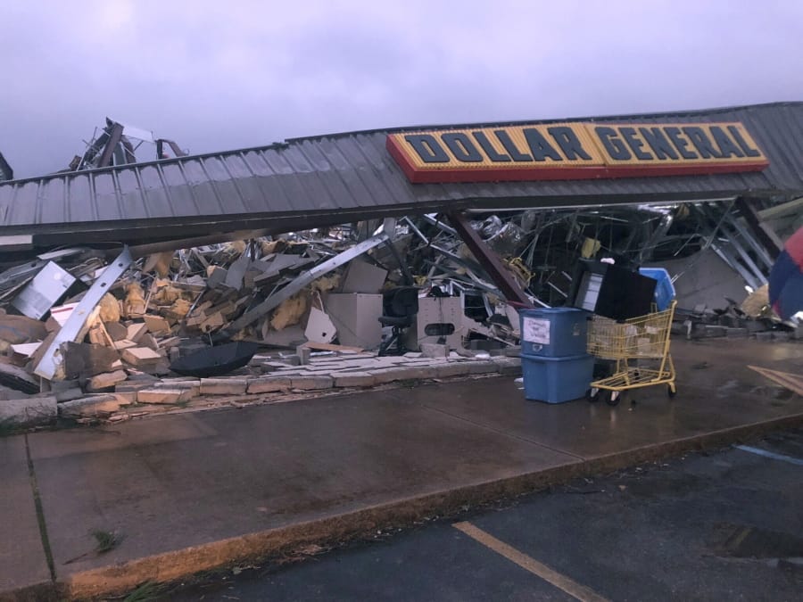 In this Tuesday, March 24, 2020 photo, a Dollar General store in Tishomingo, Miss., is completely destroyed after a suspected tornado swept through the area.