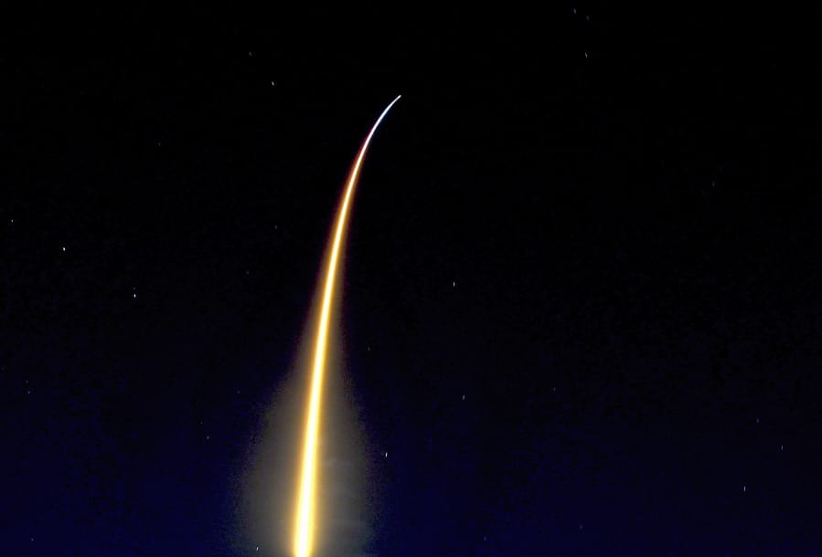 In a time exposure, a SpaceX Falcon is launched from Cape Canaveral, Fla., as seen from Viera, Fla., Friday night, March 6, 2020. The Falcon rocket blasted off with 4,300 pounds (1,950 kilograms) of equipment and experiments for the International Space Station. Just minutes later, the spent first-stage booster made a dramatic midnight landing back at Cape Canaveral, its return accompanied by sonic booms.
