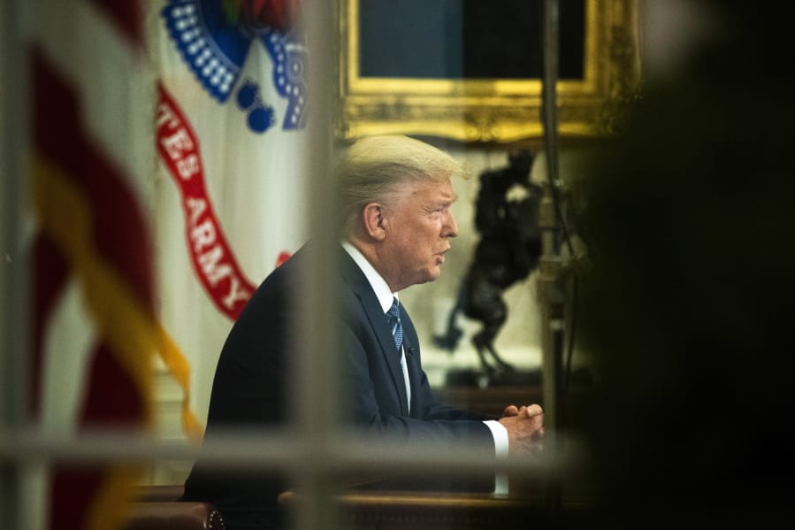 President Donald Trump addresses the nation from the Oval Office at the White House, Wednesday, March 11, 2020, in Washington.