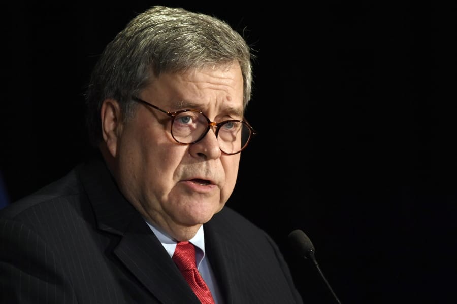 FILE - In this Feb. 10, 2020, file photo, Attorney General William Barr speaks at the National Sheriffs&#039; Association Winter Legislative and Technology Conference in Washington.