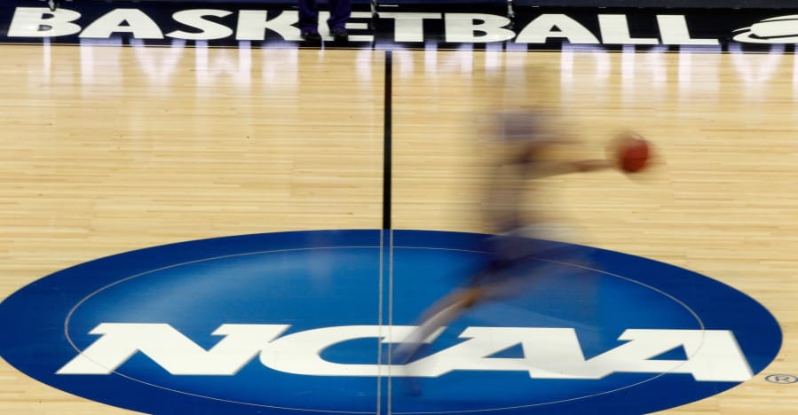 NCAA President Mark Emmert says NCAA Division I basketball tournament games will be played without fans in the arenas because of concerns about the spread of coronavirus.
