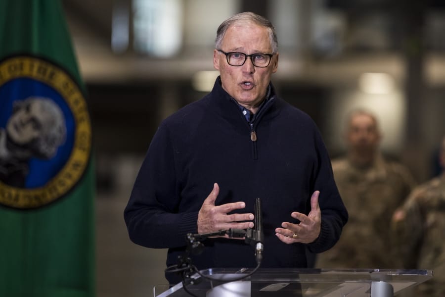 Gov. Jay Inslee discusses the deployment of a field hospital at CenturyLink Field Event Center on Saturday, March 28, 2020, in Seattle, Wash. This field hospital is expected to create at least 150 hospital beds for non-COVID-19 cases.