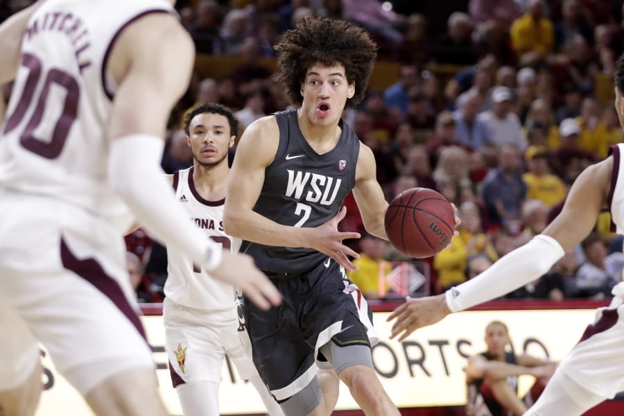 Washington State forward CJ Elleby (2) drives past Arizona State guard Alonzo Verge Jr. (11) during the first half of an NCAA college basketball game Saturday, March 7, 2020, in Tempe, Ariz.