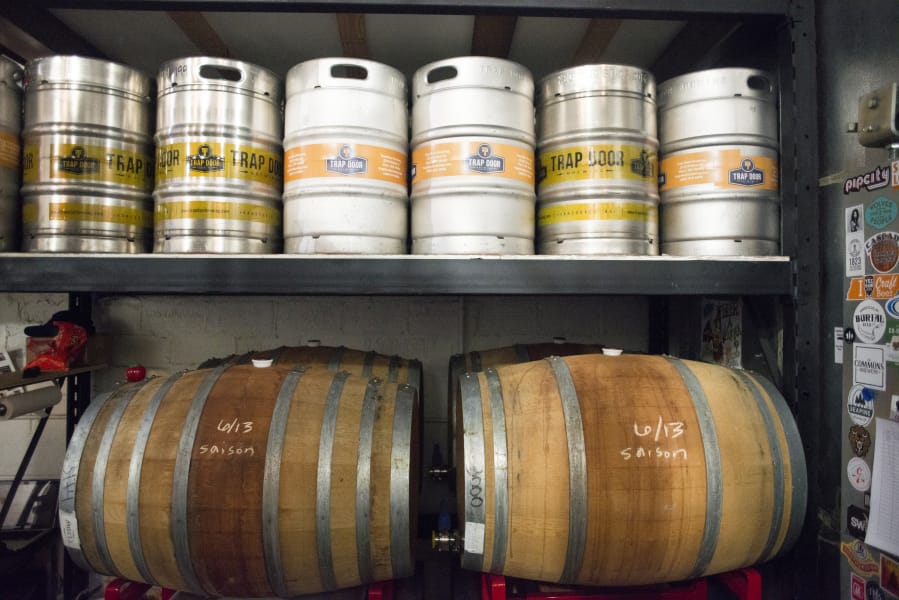 Kegs and casks are stored at Trap Door Brewing.