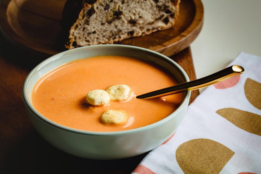 Puree the cream of tomato soup if you want it silky or leave the tomatoes chunky and add more vegetables to make a sturdier soup. (E.