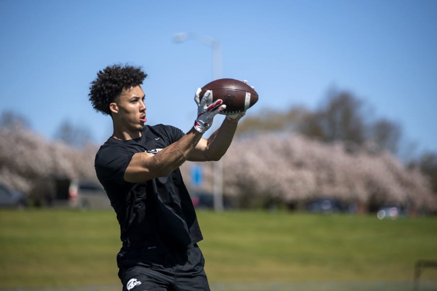 Fort Vancouver High graduate Jordan Suell runs through drills at Hudson&#039;s Bay High School in Vancouver. After a standout career at Southern Oregon University, the 6-foot-6 receiver has been training in hopes he&#039;ll be selected in the late rounds of this week&#039;s NFL Draft.