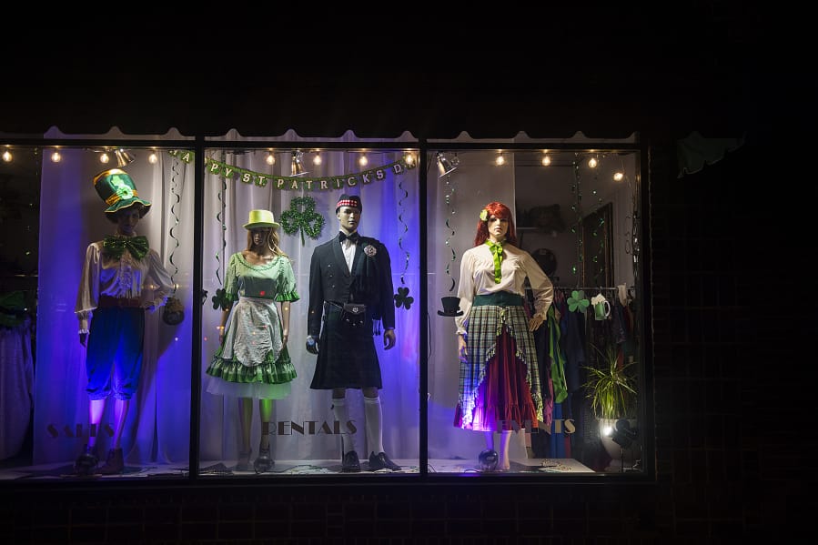 Time seems to stand still as mannequins at Center Stage Clothiers still wear outfits for a St. Patrick&#039;s Day celebration that didn&#039;t happen this year, as seen March 27.