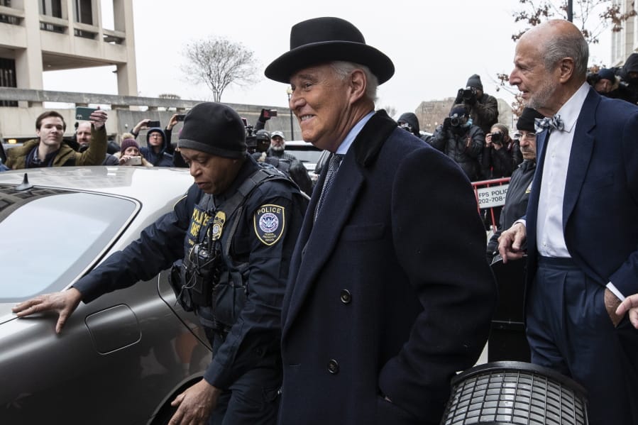Roger Stone, center, departs federal court in Washington, Thursday, Feb. 20, 2020. President Donald Trump loyalist and ally, Roger Stone was sentenced to over three years in federal prison, following an extraordinary move by Attorney General William Barr to back off his Justice Department&#039;s original sentencing recommendation. The sentence came amid President Donald Trump&#039;s unrelenting defense of his longtime confidant that led to a mini-revolt inside the Justice Department and allegations the president interfered in the case.