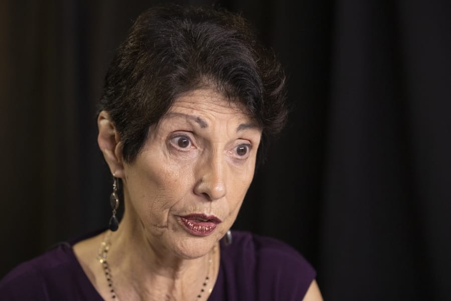 FILE - In this June 19, 2019, file photo, Diane Foley, mother of journalist James Foley, who was killed by the Islamic State terrorist group in a graphic video released online, speaks to the Associated Press during an interview in Washington. Family members of Americans who are imprisoned abroad or held hostage by militant groups say in a new report that the U.S. government must do better in communicating with them. The report from the James W. Foley Legacy Foundation is based on interviews with 25 former hostages and detainees as well as their relatives and advocates.