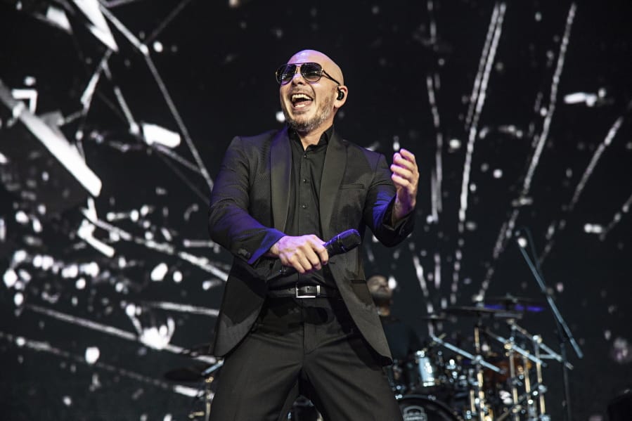 Pitbull performs May 12 at KAABOO Texas in Arlington, Texas. Pitbull released a new song titled &quot;I Believe That We Will Win&quot; hoping to uplift his fans during the coronavirus pandemic.