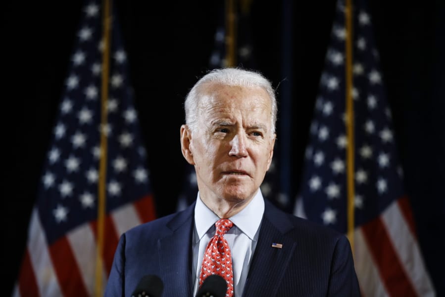 FILE - In this March 12, 2020, file photo Democratic presidential candidate former Vice President Joe Biden speaks about the coronavirus in Wilmington, Del.