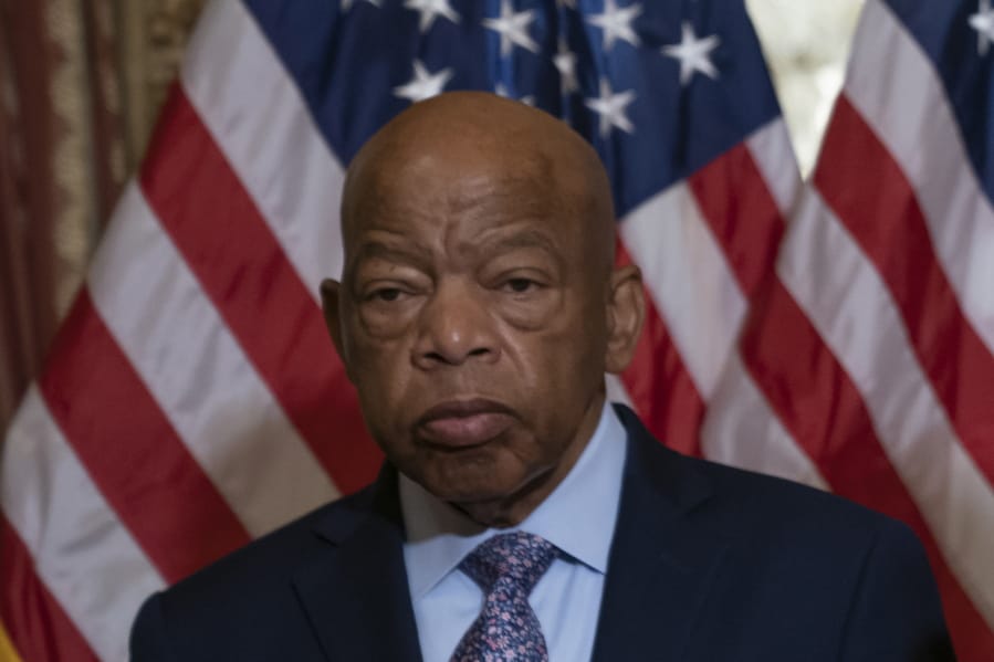 FILE - In this June 21, 2019, file photo, Rep. John Lewis, D-Ga., talks before signing the Taxpayer First Act of 2019, at the Capitol in Washington. Civil rights icon Lewis is backing Joe Biden for president, giving the prospective Democratic nominee perhaps his biggest symbolic endorsement among the many veteran black lawmakers who back his candidacy. &quot;We need his voice,&quot; the 80-year-old Lewis told reporters ahead of the campaign&#039;s Tuesday, April 7, 2020 announcement. (AP Photo/J.