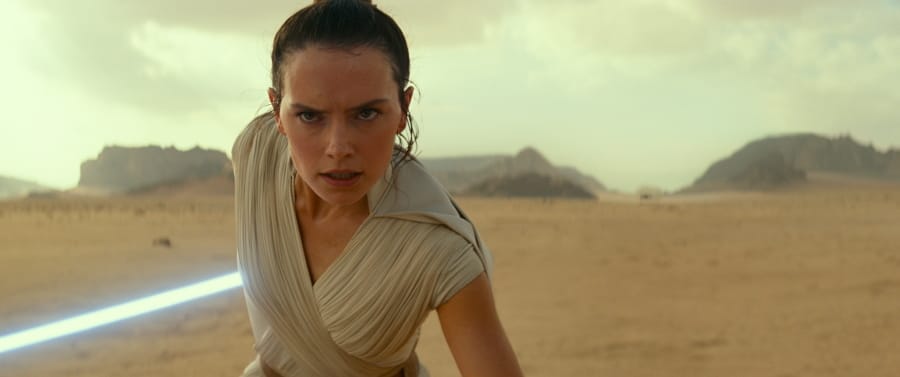 This image released by Disney/Lucasfilm shows Daisy Ridley as Rey in a scene from &quot;Star Wars: The Rise of Skywalker.&quot; The film will begin streaming on Disney Plus on May 4, about two months earlier than scheduled. (Disney/Lucasfilm Ltd.