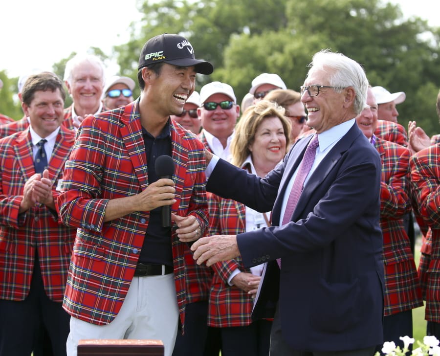Kevin Na, front left, is congratulated by Charles Schwab after winning The Charles Schwab Challenge at Colonial on May 26, 2019, in Fort Worth, Texas. The PGA Tour laid out an ambitious plan to resume its season Thursday, April 16, 2020, with hopes of a restart at Colonial on June 11-14 and keeping fans away for at least the first month. (AP Photo/ Richard W.