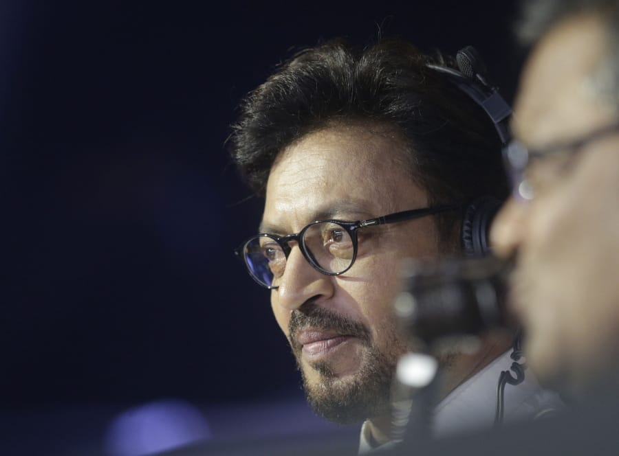 FILE- In this Oct. 23, 2017 file photo, Bollywood actor Irrfan Khan watches a Vivo Pro Kabaddi league match in Mumbai, India. Khan, a veteran character actor in Bollywood movies and one of India&#039;s most well-known exports to Hollywood, has died. He was 54.