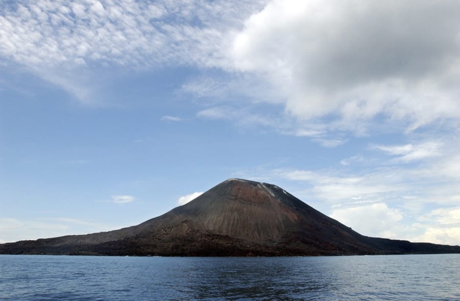 FILE - This April 10, 2004 file photo shows the volcano, Anak Krakatau, seen from the coast of West Java, Indonesia.