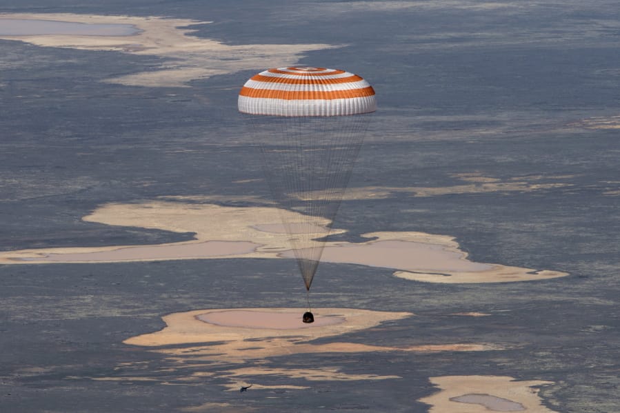 In this handout photo released by Gagarin Cosmonaut Training Centre (GCTC), Roscosmos space agency, the Soyuz MS-15 space capsule carrying International Space Station (ISS) crew members descends beneath a parachute just before landing in a remote area near Kazakh town of Dzhezkazgan, Kazakhstan, Friday, April 17, 2020. An International Space Station crew has landed safely after more than 200 days in space. The Soyuz capsule carrying NASA astronauts Andrew Morgan, Jessica Meir and Russian space agency Roscosmos&#039; Oleg Skripochka touched down on Friday on the steppes of Kazakhstan.