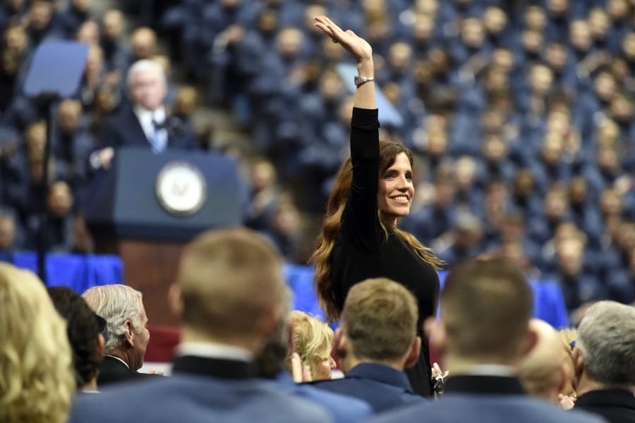 South Carolina state Rep. Nancy Mace, the first woman to graduate from The Citadel, smiles after being recognized by Vice President Mike Pence during a speech at the The Citadel, Thursday, Feb. 13, 2020, in  Charleston, S.C.