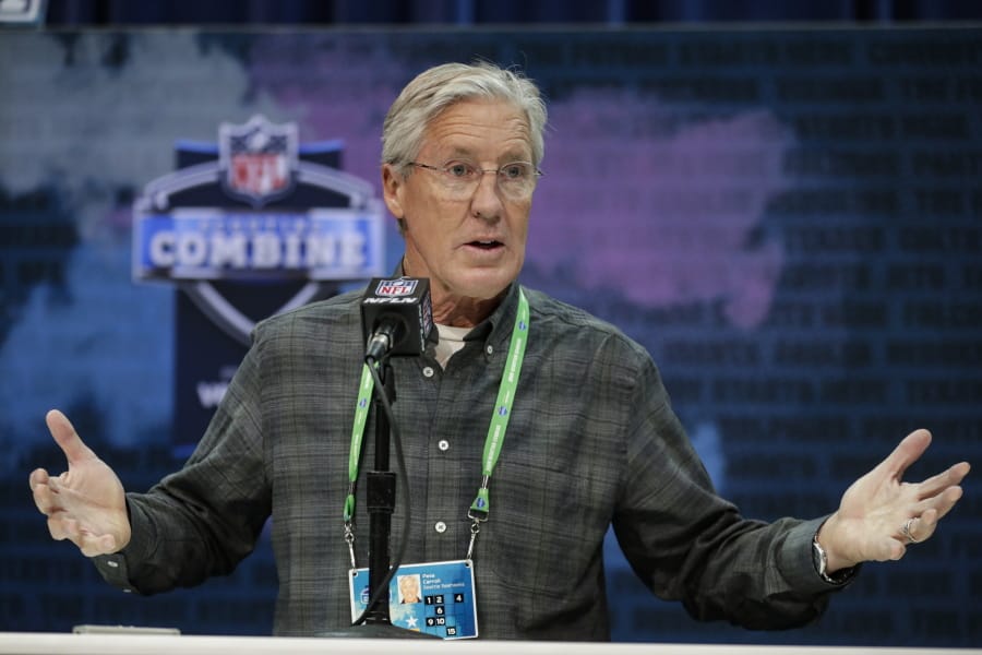 Seattle Seahawks head coach Pete Carroll speaks during a press conference at the NFL football scouting combine in Indianapolis. The NFL Draft is April 23-25.