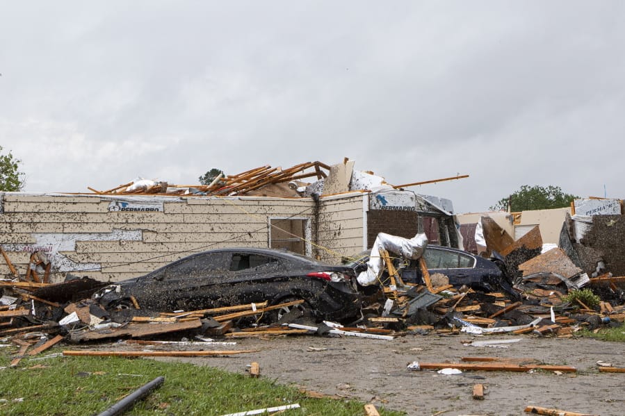 A home had its roof torn off after a tornado ripped through Monroe, La. just before noon on Sunday, April 12, 2020 causing damage to a neighborhood and the regional airport.