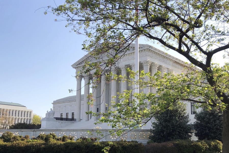 The Supreme Court is shown, Monday, April 6, 2020 in Washington. The Supreme Court on Monday rejected an appeal from the Catholic church in Washington, DC, that sought to place religious-themed ads on public buses.