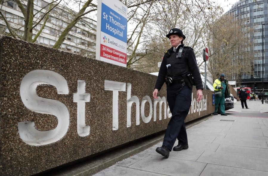 A police officer patrols outside a hospital where it is believed but not confirmed that Britain&#039;s Prime Minister Boris Johnson is undergoing tests after suffering from coronavirus symptoms, in London, Monday, April 6, 2020. British Prime Minister Boris Johnson has been admitted to a hospital with the coronavirus. Johnson&#039;s office says he is being admitted for tests because he still has symptoms 10 days after testing positive for the virus.