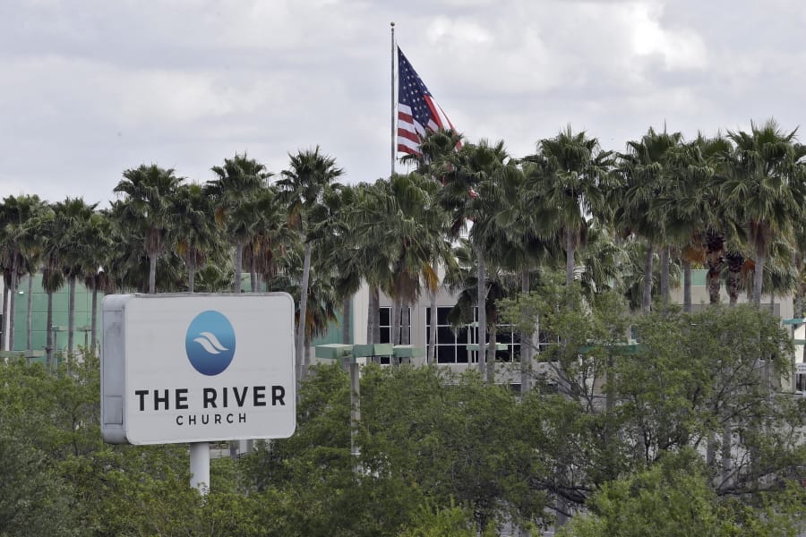 FILE - This Monday, March 30, 2020 file photo shows The River Church in Tampa, Fla. Pastor Rodney Howard-Browne was arrested Monday, March 30, 2020, for violating a county order by hosting a large number of congregants at the church.