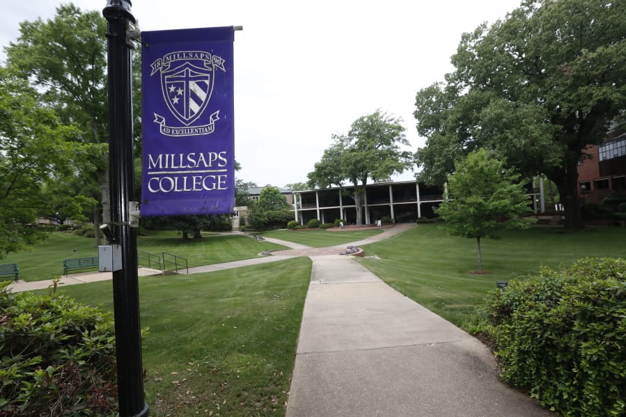 A normally student filled campus square at Millsaps College in Jackson, Miss., is deserted in face of the coronavirus, as the liberal arts school, like many others, faces financial and enrollment challenges Friday, April 3, 2020. At present, the school has switched to on-line teaching. Colleges across the nation are scrambling to close deep budget holes and some have been pushed to the brink of collapse after the coronavirus outbreak triggered a series of financial losses (AP Photo/Rogelio V.