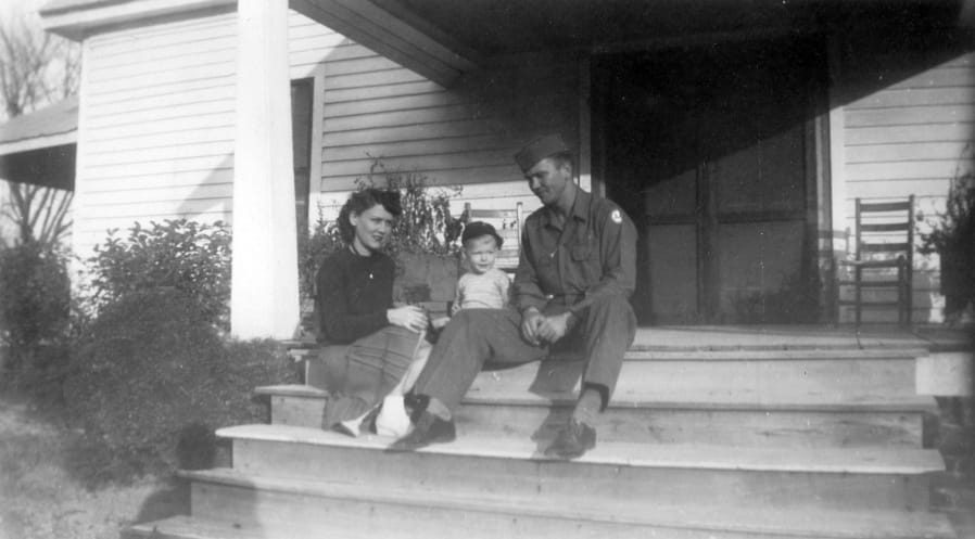 In this image provided by the McConnell Center at the University of Louisville, Mitch McConnell sits with his parents, Julia &quot;Dean&quot; and A.M. McConnell in this image from the mid 1940&#039;s in Five Points, Ala. As the coronavirus pandemic unfolds, Senate Majority Leader Mitch McConnell flashes back to an earlier crisis that gripped the nation, and his own life, when he was a boy. He was struck with polio.