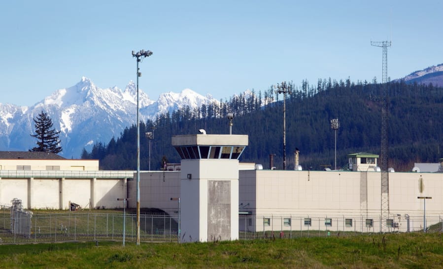 The Monroe Correctional Complex in Monroe, Wash., is shown. Inmates at the prison filed a motion Thursday, April 9, 2020, with the Washington state Supreme Court asking it to order Gov. Jay Inslee and Department of Corrections Secretary Stephen Sinclair to release inmates who are 60 years old or older, those with underlying health conditions, and any who are close to their release date after almost a dozen people at the prison tested positive for the new coronavirus. (Ellen M.