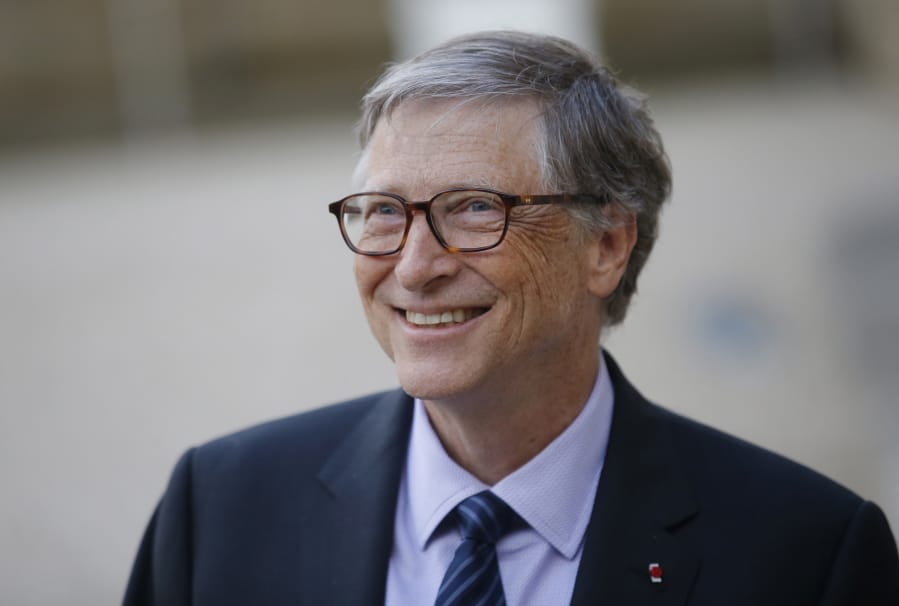 FILE - In this April 16, 2018, file photo, Bill Gates, Co-Chair of the Bill &amp; Melinda Gates Foundation, talks to the media after a meeting with French President Emmanuel Macron at the Elysee Palace in Paris. The Seattle region is home to the two richest men in America, but while Amazon&#039;s Jeff Bezos is blamed by some for rising rents and clogged city streets, Gates is largely admired for helping lead the computing revolution and for the billions he donates through his philanthropy.